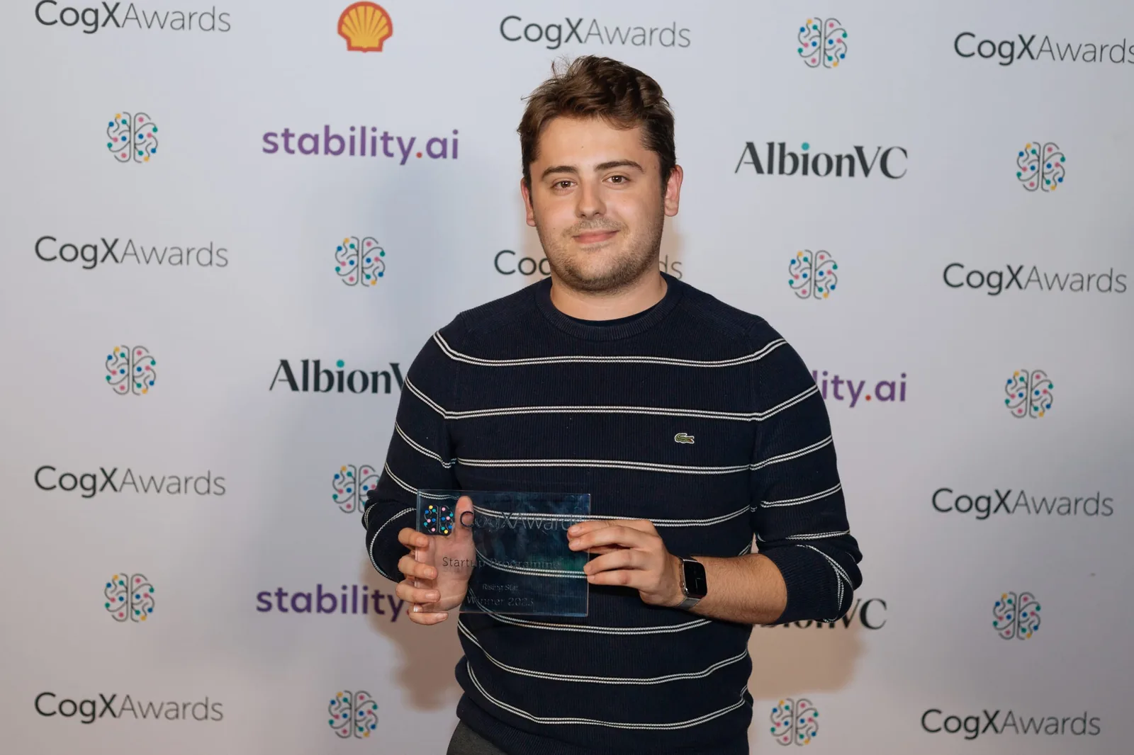 Joe accepting an award at CogX